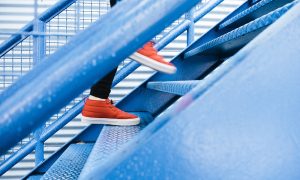 Image of someone climbing stairs