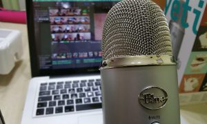 Image of microphone and laptop