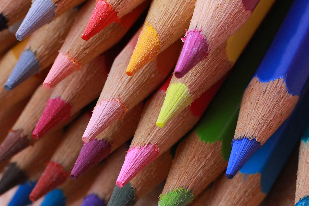 Image of crayons to illustrate the idea of adding 'colour' to your work as a writer