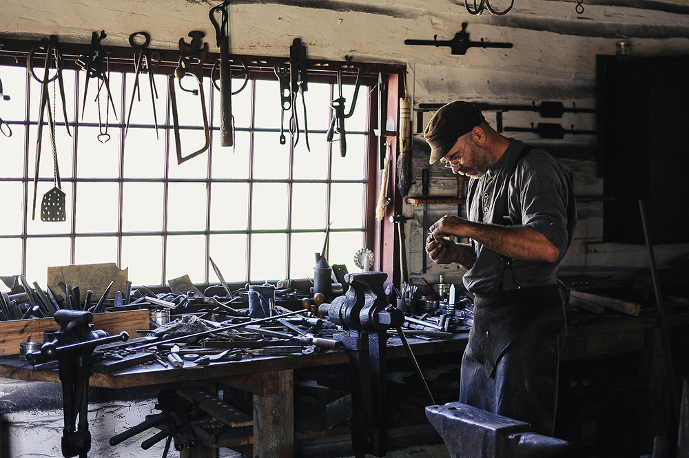 Image of artisan in his workshop
