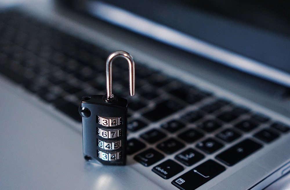 Image of a computer keyboard and combination lock